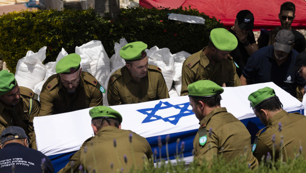 Soldiers carry the coffin of IDF soldier Dor Zimel during his funeral on Monday in Even Yehuda, Israel. Zimel was wounded in a Hezbollah drone attack in on Thursday, and later succumbed to his wounds.
