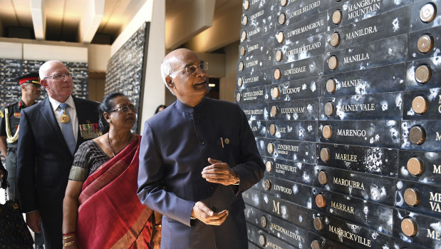 Indian President Ram Nath Kovind and his wife Savita with NSW Governor David Hurley at Sydney's Anzac Memorial.