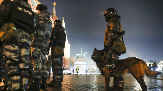 Servicemen of the Russian National Guard gather at the Red Square to prevent a protest rally for Navalny. 