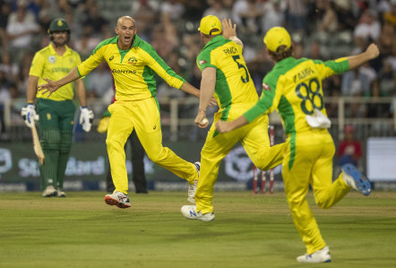 Ashton Agar celebrates with teammates after dismissing South Africa's Dale Steyn in February.