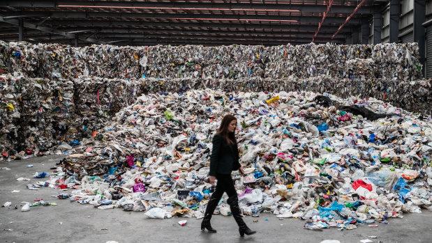 Carly Whitington walks through her company's Derrimut warehouse.