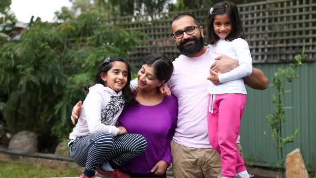 Ash and Niketa Parmar will keep their daughters Natalia, 8, and Aaliya, 5, home from school longer.