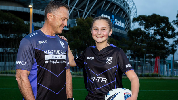 Former NRL referee Steve Clark and daughter Bailey.