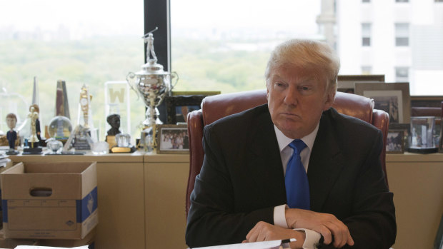 Donald Trump, pictured in his office during the 2016 presidential campaign, has leveraged his image as a successful and wealthy developer to become President.
