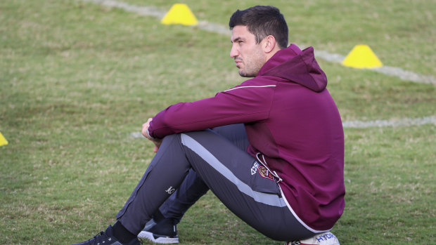 Sidelined: Matt Gillett was relegated to spectator at Queensland training on Sunday as he races to be fit for Origin III. 