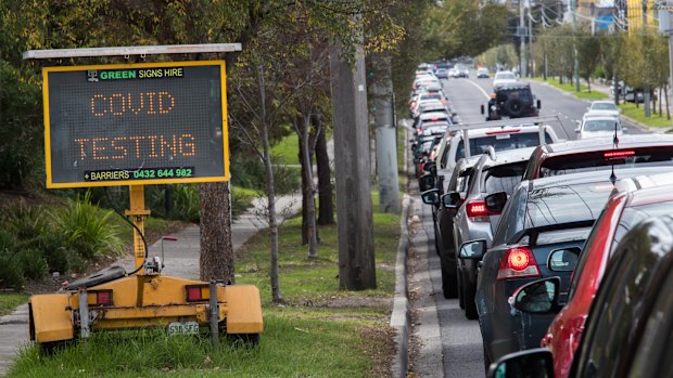 A long line of cars waiting to enter a COVID-19 testing site in suburban Maidstone on Tuesday.