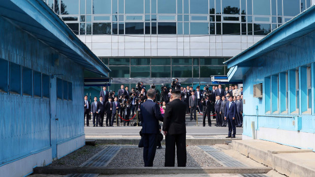 South Korean President Moon Jae-in, left, and North Korean leader Kim Jong-un pose for a photograph as they meet at the truce village of Panmunjom in the Demilitarized Zone last month.