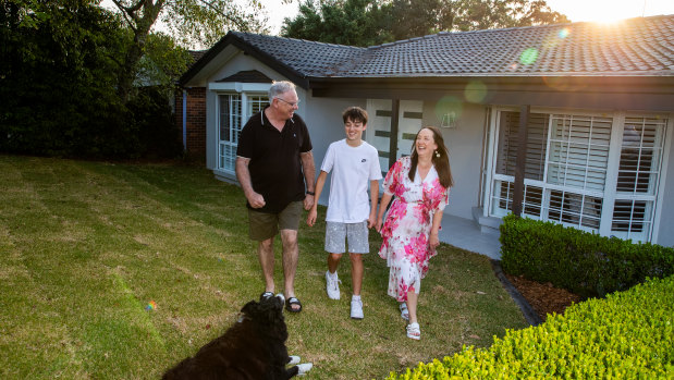 Sellers Peter and Cristina Cameron, with son Jack, at their home in Glenhaven – where property prices have reached new heights.
