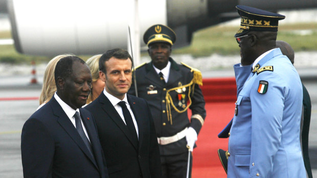 French President Emmanuel Macron is welcomed by Ivory Coast President Alassane Ouattara upon arrival in Abidjan at the weekend.