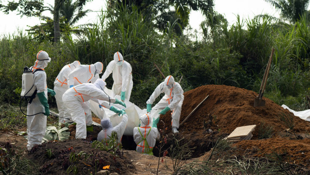 An Ebola victim is put to rest at the Muslim cemetery in Beni, Democratic Republic of Congo.