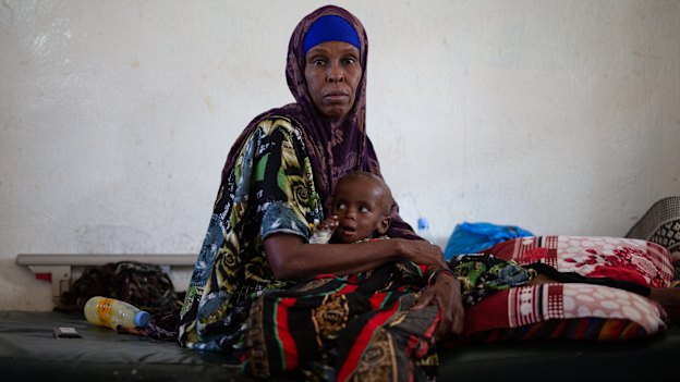 Farhan Apti is nursed by his grandmother Arfi Jama at Burao General Hospital in Somaliland. The 17-month-old is being treated for malnutrition.