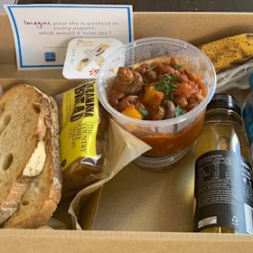 Hilton Hotel quarantine breakfast - baked beans with potato and mushroom; toast; fruit; yoghurt; banana bread; juice.