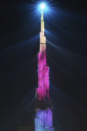An LED light show illuminates the Burj Khalifa, the world's tallest building on New Year's Eve, 2018.