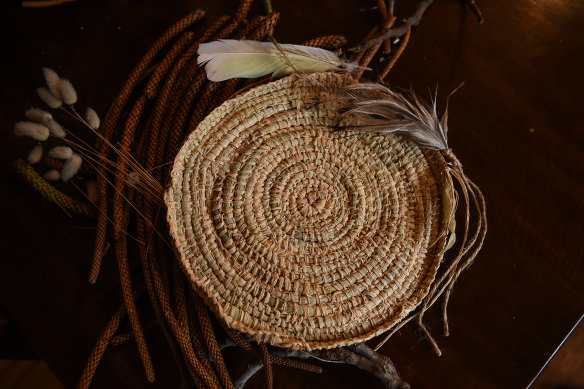 One of the woven grass baskets.