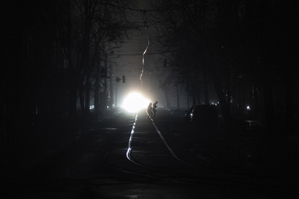 Kyiv’s city centre is in darkness after Russian missile attacks took out the power grid.