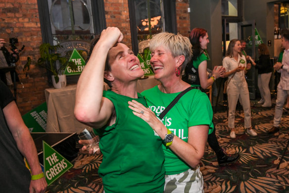 Greens supporters celebrate their newfound influence in Victorian politics on Saturday night.