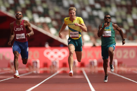Ashley Moloney, centre, performed strongly in his 100m heat as part of the decathlon.