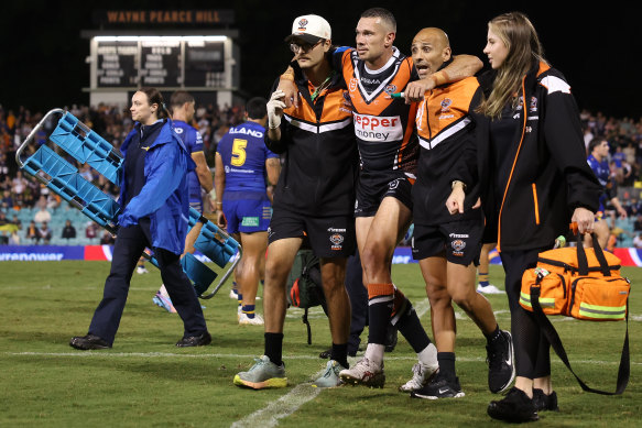 Brent Naden leaves the field on Friday night.
