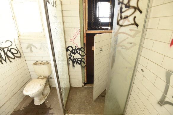 The shower trapdoor that leads into an elevator shaft - one of several unexpected discoveres.