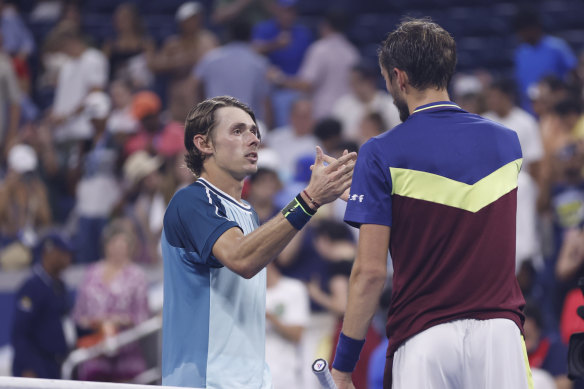 Alex de Minaur shakes Daniil Medvedev’s hand after his US Open exit.