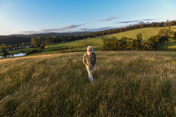 Yuin man Bruce Pascoe on his property Yumburra near Mallacoota. The Black Summer bushfires burned much of his property. The two large paddocks where he grows Australian grasses were also burned but have surged back stronger than ever.
