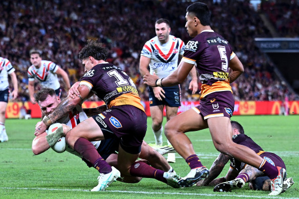 Angus Crichton goes over for the Roosters.