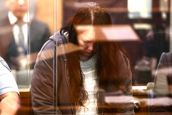 Hakyung Lee is held in the platform at the High Court of Auckland on Monday.