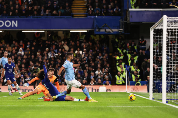 Manchester City’s Riyad Mahrez scores the decisive goal against Chelsea.