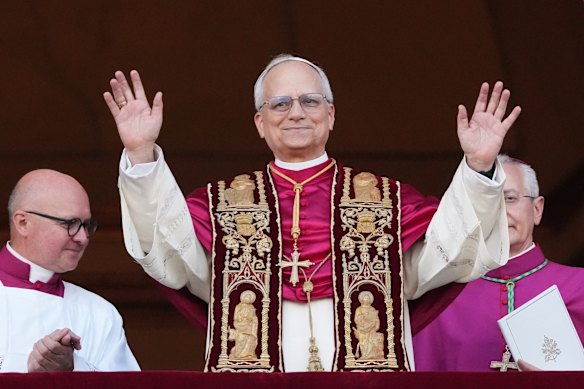 New Pope Leo XIV appears on the central loggia of St Peter’s Basilica.