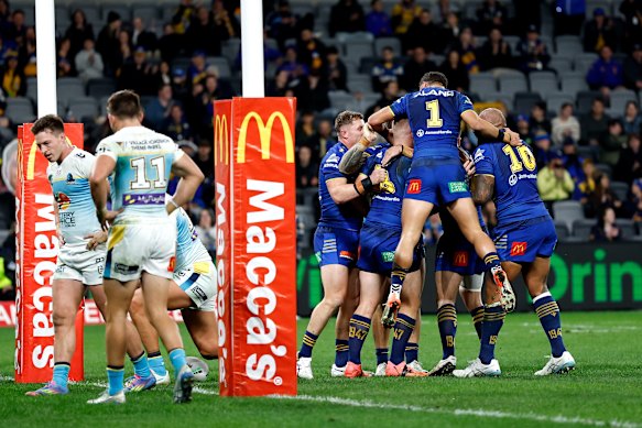 Parramatta celebrate Joey Lussick’s try against Gold Coast.