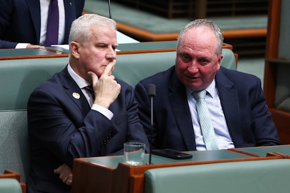 MP for Riverina Michael McCormack and MP for New England Barnaby Joyce in discussion in parliament. 