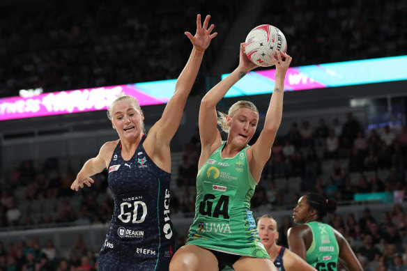 Fever’s Sasha Glasgow wins the ball against Melbourne’s Jo Weston.