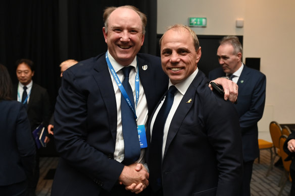 Brett Robinson is congratulated by RA boss Phil Waugh in Dublin after the vote. 