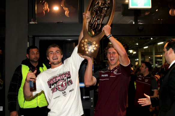Kieran Foran and Daly Cherry-Evans arrive at the Manly Leagues Club with the NRL trophy in 2011.