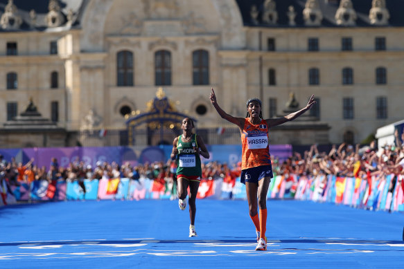 Sifan Hassan is first to cross the line in the marathon in Paris.