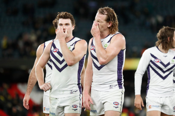 Blake Acres and David Mundy react after the draw with Richmond in round 19 last year.