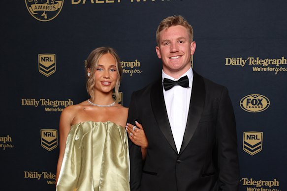 Tom Dearden and partner Millie Oliver, who is eight months pregnant.