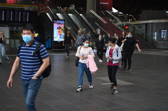 Peak-hour commuters at Southern Cross Station on Monday morning. 