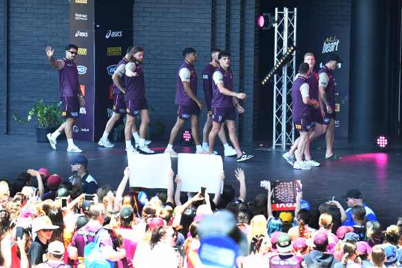 Broncos players greet fans at Riverstage on Monday.