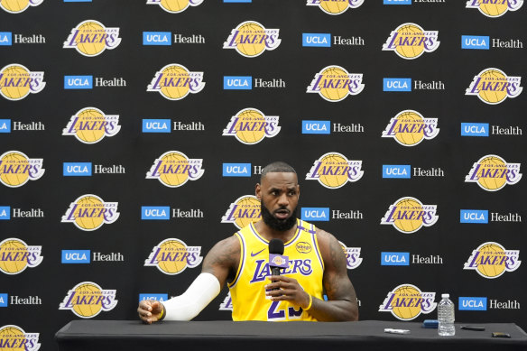 Los Angeles Lakers’ LeBron James talks to reporters.