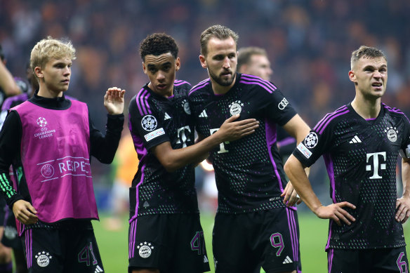 Joshua Kimmich and Harry Kane celebrate the latter’s go-ahead goal for Bayern in Istanbul.