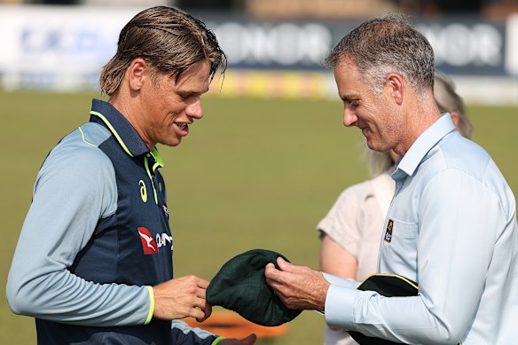 Cooper Connolly accepts his baggy green cap from Simon Katich in Sri Lanka.