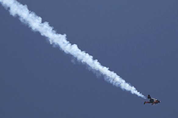 Reffet, known as one of Dubai's "jetmen", flies over Dubai's Palm Island in 2015. 