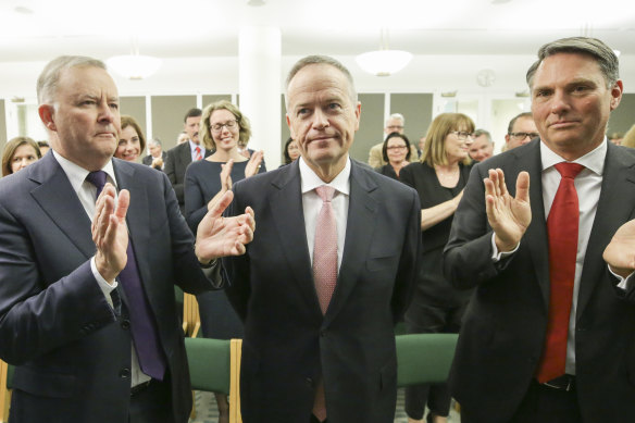 Labor leader Anthony Albanese and deputy Labor leader Richard Marles applaud Bill Shorten at a caucus meeting in Canberra on Thursday.