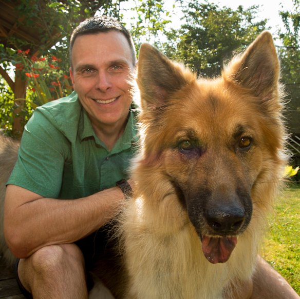 Matt Kaeberlein, co-founder of the Dog Aging Project, with Dobby, his German shepherd who died last year aged 14.