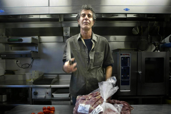 Bourdain back in the kitchen during a 2005 visit to Sydney.