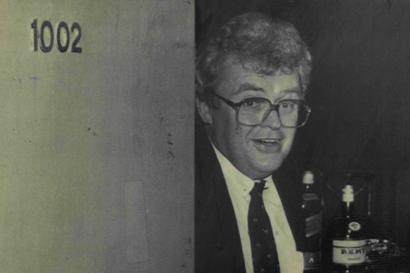 Graham Richardson stands guard at the door of Room 1002 in the Wrest Point casino in the 1980s.