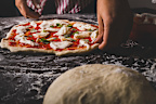 Pizza dough is surprisingly one of the easiest and most rewarding recipes you can make from scratch.