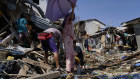 Residents salvage parts of their damaged homes following Typhoon Rai in Cebu province, central Philippines at the weekend.