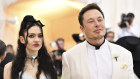 Elon Musk with his partner, Grimes, the mother of three of his children.